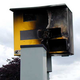 Illustration for article titled Dumb British Hooligans Burning Traffic Cams in England